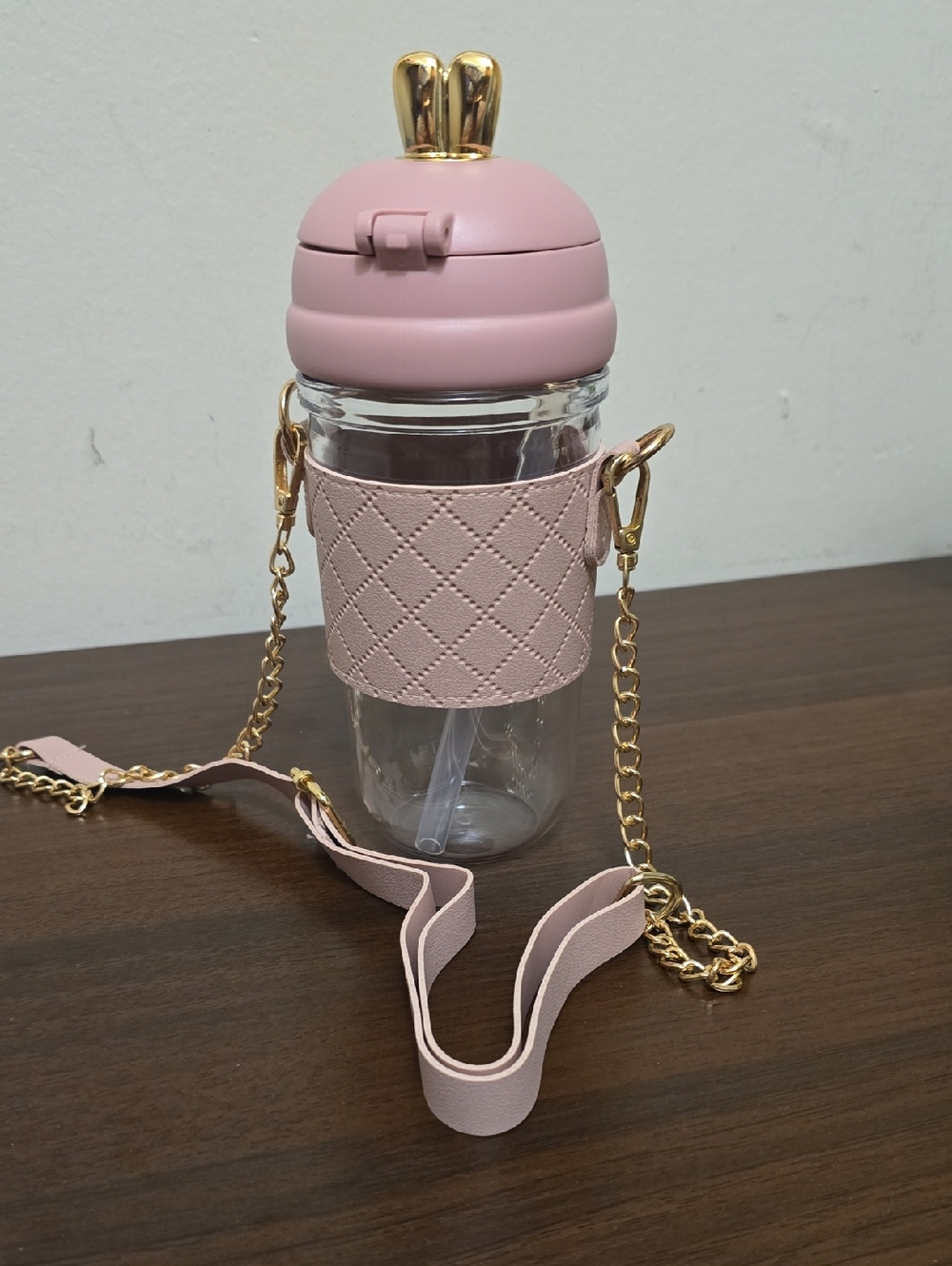 Pink Quilted Crossbody Bottle with Gold Accents